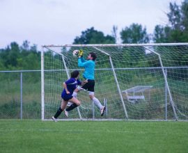 Goalie making a save