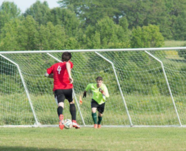 player approaches the net with the ball